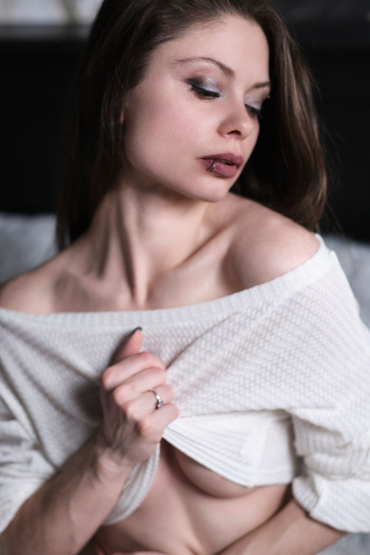 Sweater Boudoir Photography woman clutching sheer sweater sensual