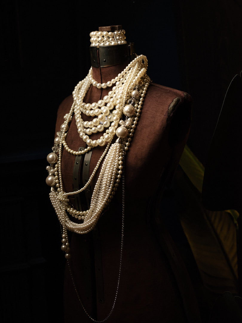 Mannequin with pearl necklaces in our Toronto Boudoir Photography studio